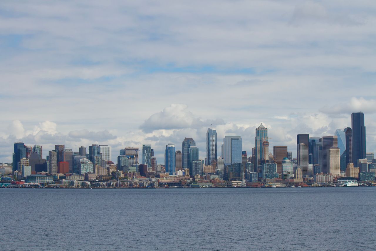 gallery-05 Scenic view of Seattle's iconic skyline with prominent skyscrapers and waterfront.